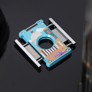 Metallic card holder with blue and brown design on a dark background