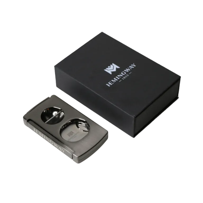 Cigar cutter and black box with Hemingway logo on a white background