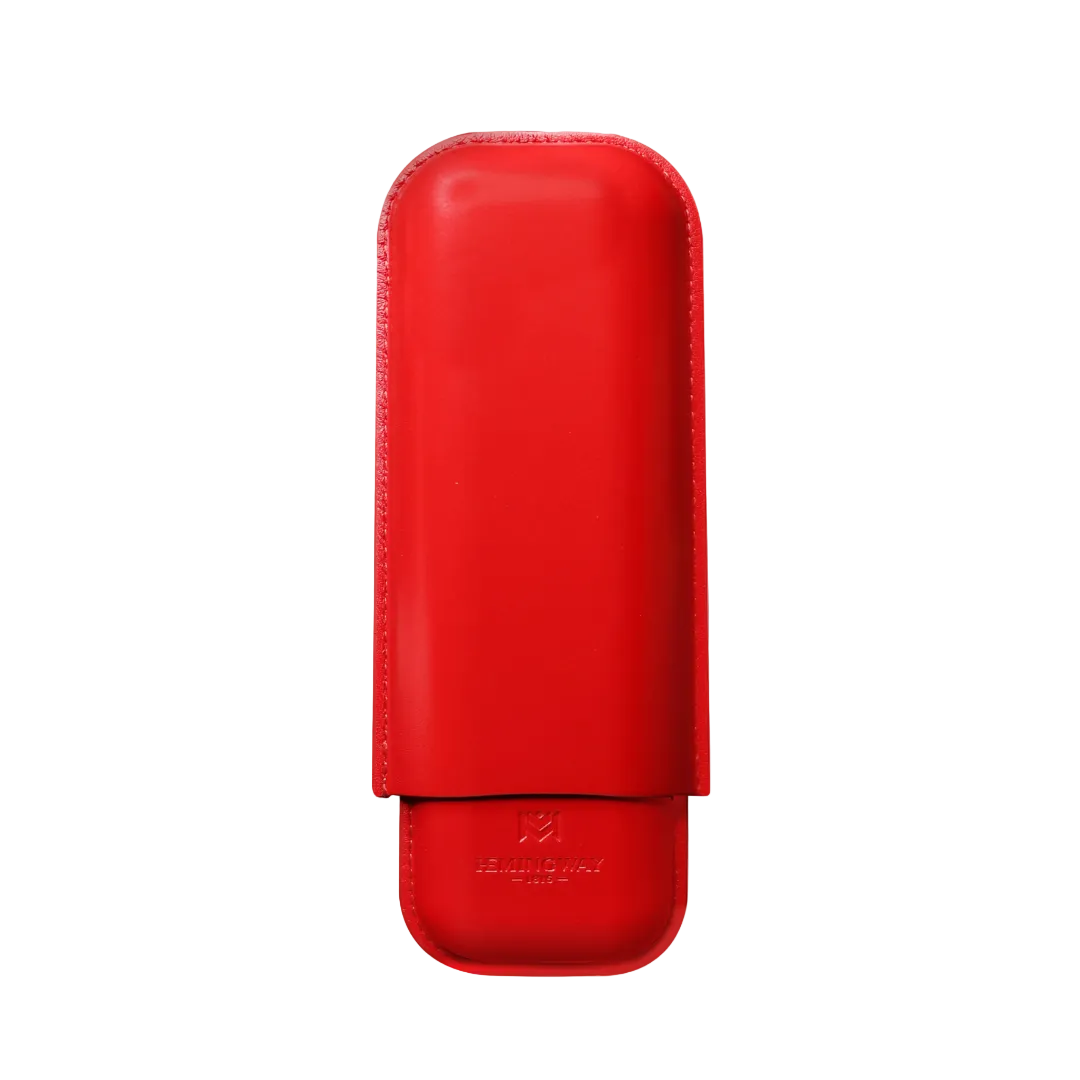 Red leather cigar case on a white background