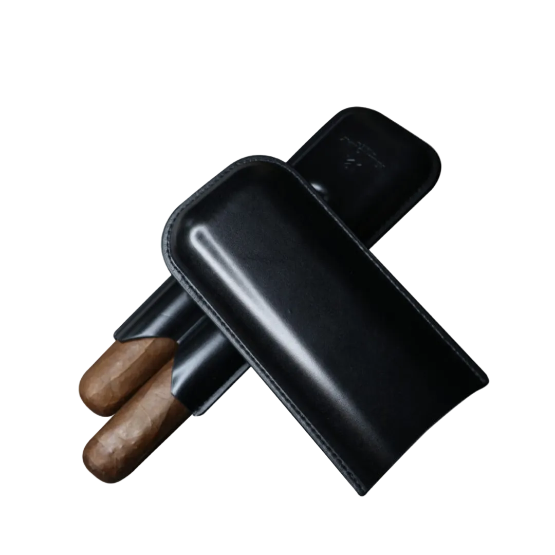 Slim black leather cigar case designed for travel and executive carry