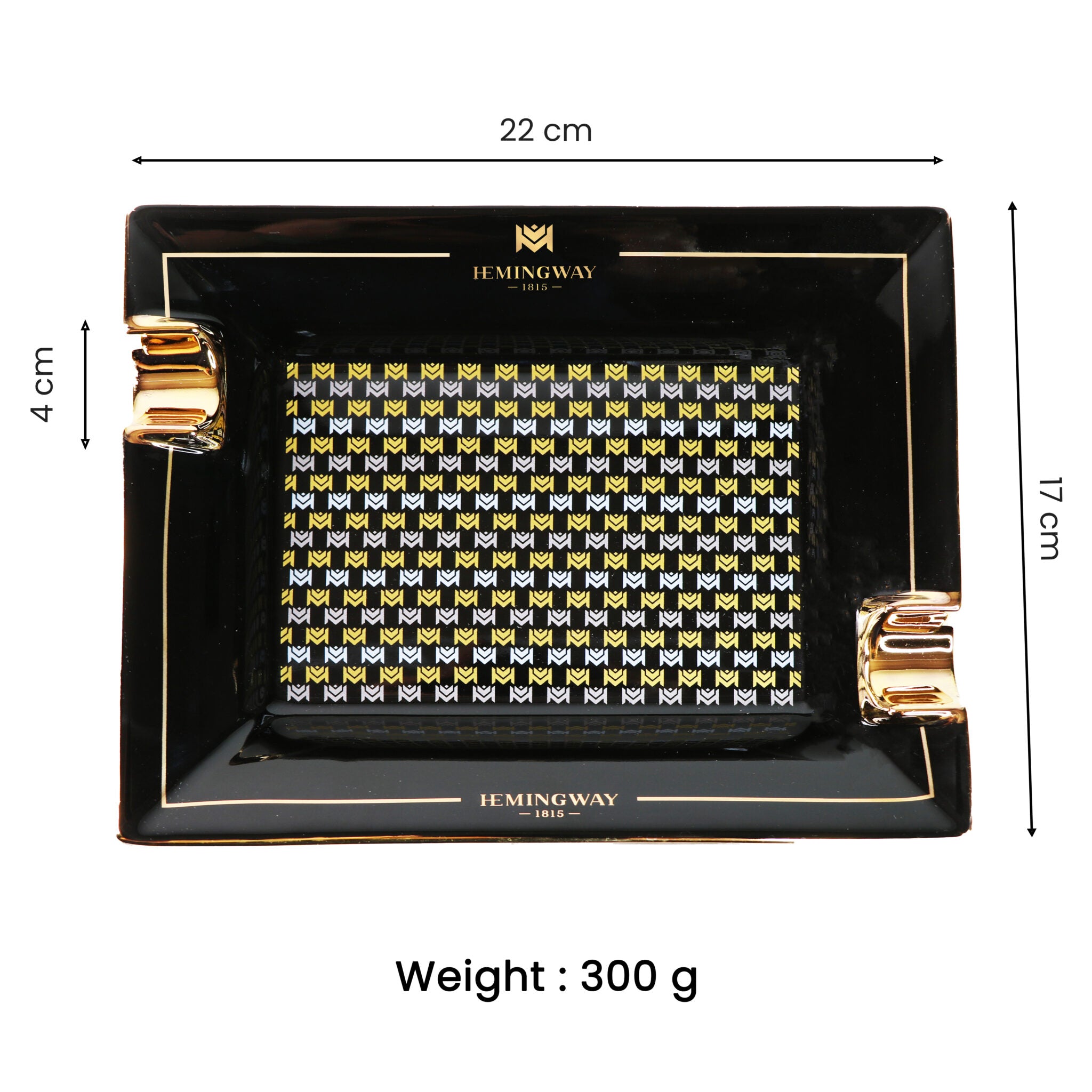 Black tray with gold handles and a patterned interior, featuring the brand 'HEMINGWAY'.