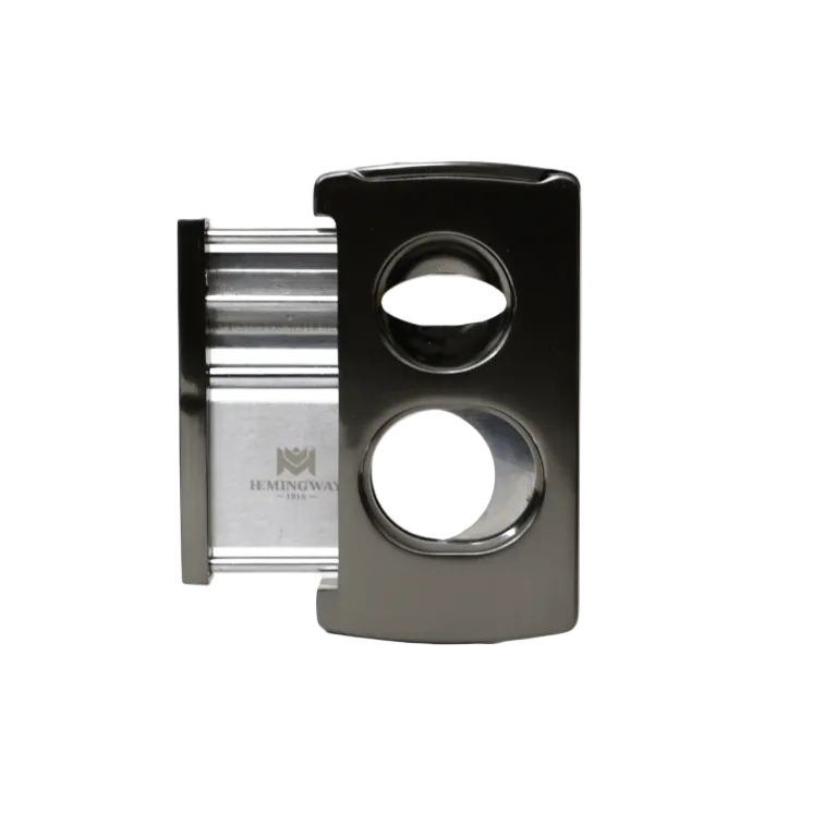 Cigar cutter with black and silver design on a white background