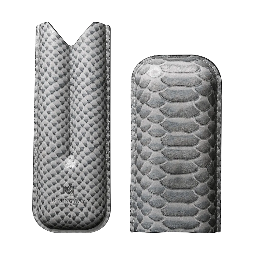 Two snake skin patterned phone cases on a white background