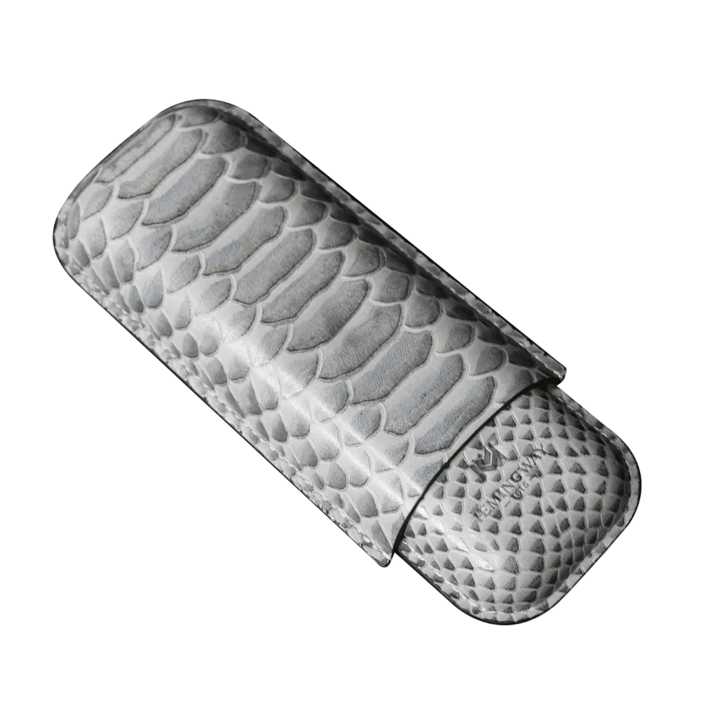 Cylindrical metallic object with textured surface on a white background
